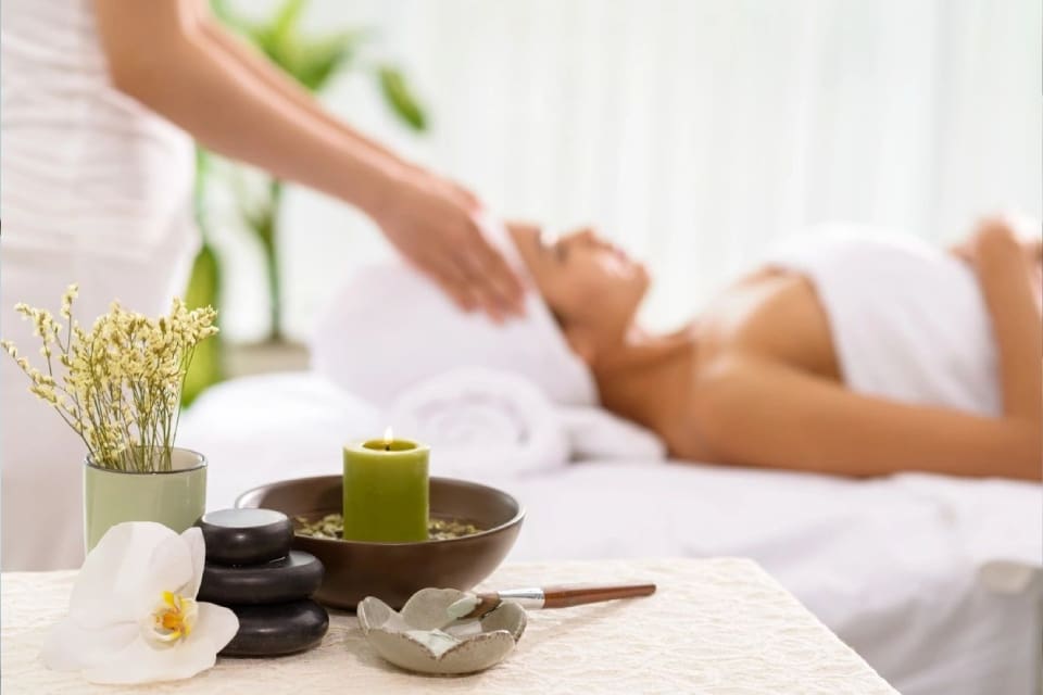 A woman getting her head washed at the spa